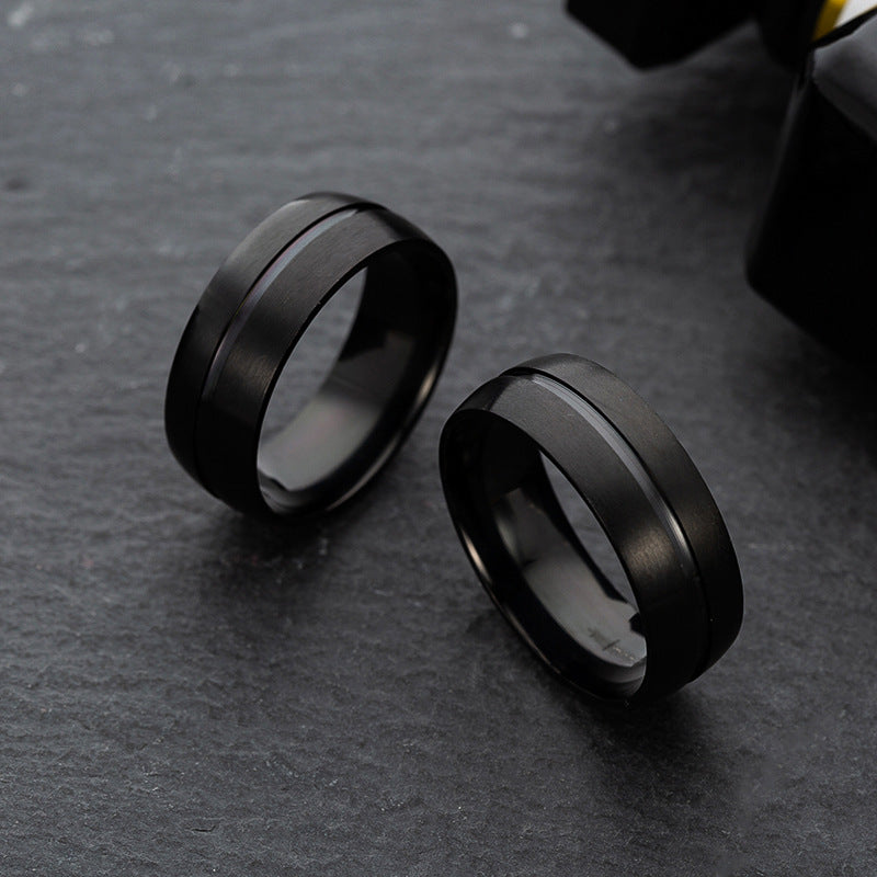 Bague homme noire en acier inoxydable avec design géométrique minimaliste, style streetwear urbain